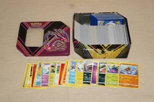 lot 56 image: Metal Tin of Pokemon Cards