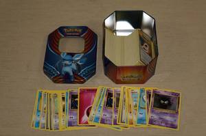 lot 55 image: Metal Tin of Pokemon Cards