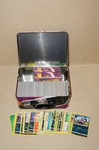lot 58 image: Metal Lunchbox of Pokemon Cards and Storage