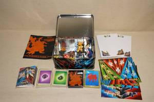 lot 44 image: Metal Pokemon Lunch Box of Game Accessories