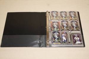 lot 65 image: Binder of Randy Moss Cards