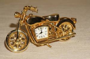 lot 93 image: Gold Tone Motorcycle Clock
