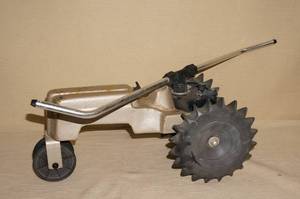 lot 105 image: Metal Tractor Lawn Sprinkler - Appears Craftsman
