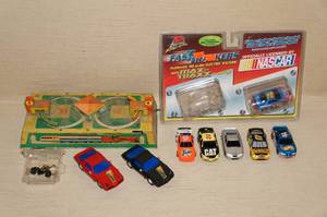 lot 170 image: Slot Cars and Tin Toy Accessory