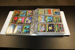 Binder Full of Teenage Mutant Ninja Turtles and Marvel Cards