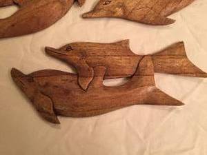lot 32 image: Lot of Four Wooden Dolphin Carvings
