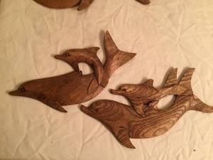 lot 50 image: Six Wooden Dolphin Carvings