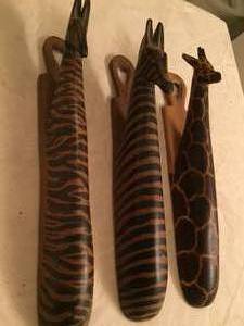 lot 69 image: Three Hand Carved Giraffe & Zebra Wall Hangings (Kenya)