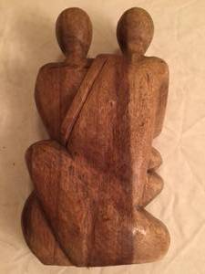 lot 72 image: Parents and Baby Carving