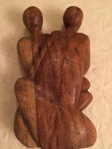lot 73 image: Parents and Baby Carving