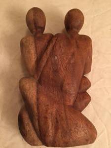 lot 76 image: Parents and Baby Carving