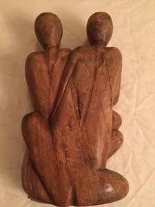 lot 77 image: Parents and Baby Carving