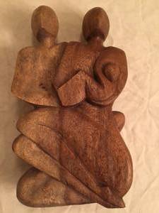 lot 78 image: Parents and Baby Carving