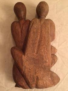 lot 79 image: Parents and Baby Carving