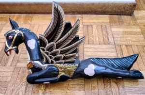 lot 18 image: Black Painted Flying Wood Horse