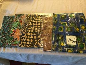 lot 256 image: 5 Dresses New in The Package Size XL in Assorted Patterns