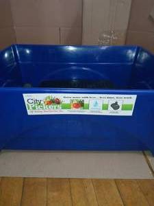 24.5 in. x 20.5 in. Patio Raised Garden Bed Kit with Watering System and Casters in Cobalt Blue by CITY PICKERS- not used