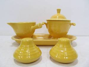 lot 42 image: Vintage FIESTA Ware Cream & Sugar Set wTray - 2 Shakers