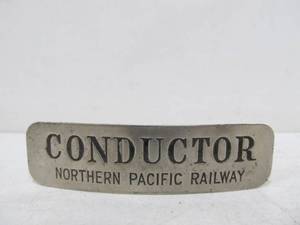 lot 112 image: Antique NORTHERN Pacific Railway Railroad Conductor Hat Badge