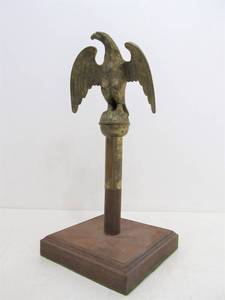 lot 227 image: Nicely Detailed Vintage Solid Brass American Eagle Flagpole Topper on Wood Display Stand