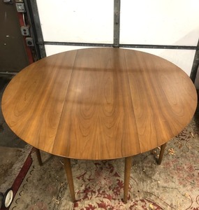 lot 23 image: Large Mid Century Round Gate-Leg Drop Leaf Solid Wood Dining Table