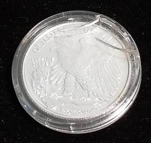 14 TROY OZ. .999 FINE SILVER WALKING LIB DESIGN