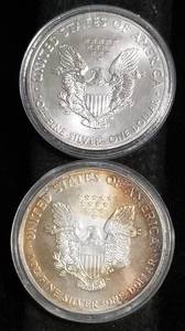 2 AMERICAN SILVER EAGLES 1 TROY OZ .999 FINE SILVER IN AIRTITES 2000 2015