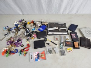 lot 90 image: Zippo Lighters, Keys, Keychains, Wallets, and More