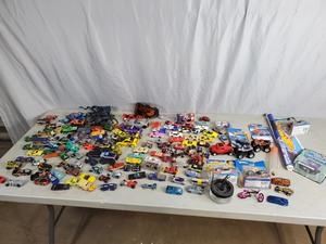 lot 106 image: Large Lot of Matchbox Cars, Hot Wheels, Monster Trucks, and More