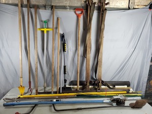 lot 147 image: Ice Auger, Long Handle Tools, Garden Stakes, and More