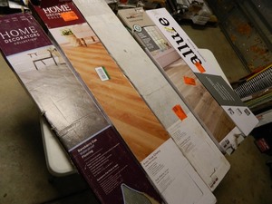 lot 37 image: 5 Cases - Assorted LVP Vinyl Plank Flooring - Take What You Want