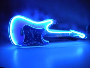 lot 26 image: VINTAGE NEON GUITAR CLOCK - WORKS - APPROX 29 BY 12 - SEE PICTURES