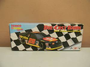 lot 41 image: ROBERT YATES RACING DIE CAST BANK 1994 COLLECTORS EDITION - THE 1994 TEXACOHAVOLINE FORD THUNDERBIRD - NEW IN BOX - SEE PICTURES