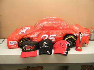 lot 44 image: BUDWEISER RACING COLLECTION - 3 VERY NICE HATS, LIKE NEW - BOTTLE KOOZIE - LARGE BLOW UP BUDWEISER RACING CAR - SEE PICTURES