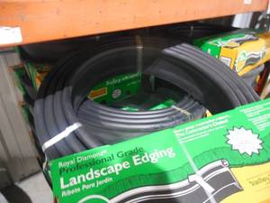 lot 82 image: (8) Professional 20 ft. L x 1 in. W Black Plastic Lawn Edging
