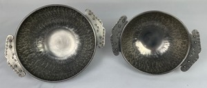 lot 3 image: Set of Two Handmade Hammered Pewter Bowls with Handles.