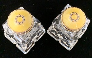 lot 15 image: Set of Two Crystal Salt & Pepper Shakers w Sterling, Yellow-Enameled Tops.