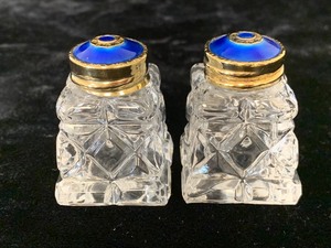 lot 16 image: Set of Two Crystal Salt & Pepper Shakers w Sterling, Royal Blue-Enameled Tops.