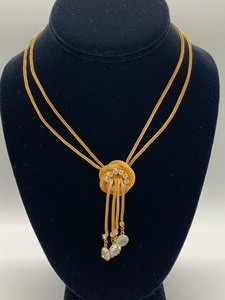 lot 54 image: Elegant Knot-Style Braided Necklace w Rhinestones and Hanging Crystals.