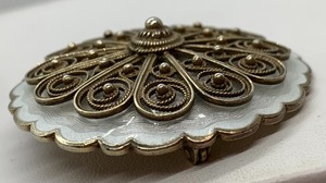 lot 55 image: Ivar T. Holth Guilloche Sterling White Enamel and Filigree Brooch