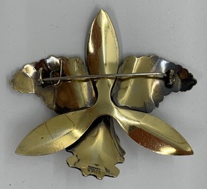 lot 73 image: Askel Holmsen Sterling Silver, WhitePurple Enamel Flower Brooch