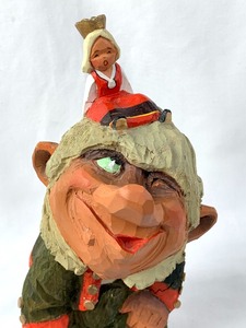 lot 83 image: Henning Hand-Carved Wooden Troll with Singing Princess on His Head