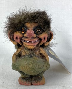 lot 108 image: Small Good Luck Troll, Hands in Pockets