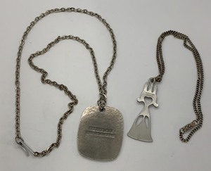 lot 130 image: Two Scandinavian Necklaces - Smiling Troll Pewter Pendant and St. Lucia Modernist Pendant