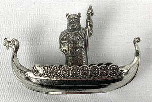 lot 136 image: TPB Tinn Viking Figure in a Boat, New in Original Box