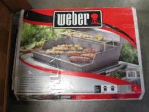 lot 75 image: Weber Cast Iron Cooking Grate...