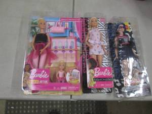 3 Barbies...