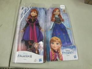 2 Frozen Anna Dolls...