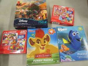 4 Assorted Puzzles...