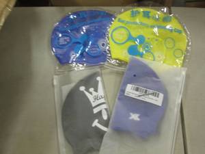 4 Swim Caps...